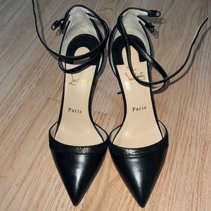 christian louboutin uptown double pumps in black.